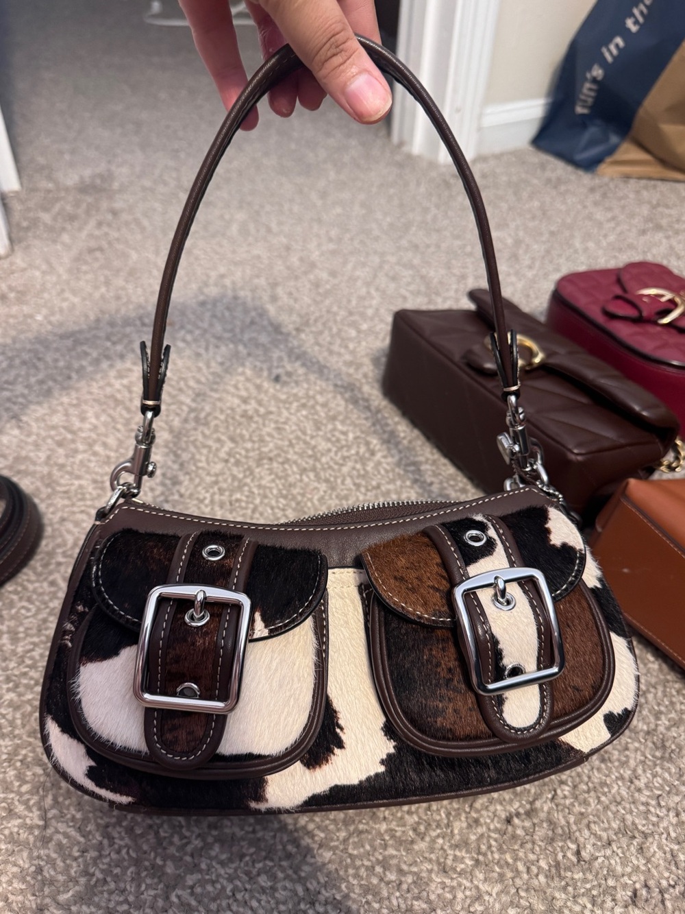 Coach Cow Print Ashton Bag